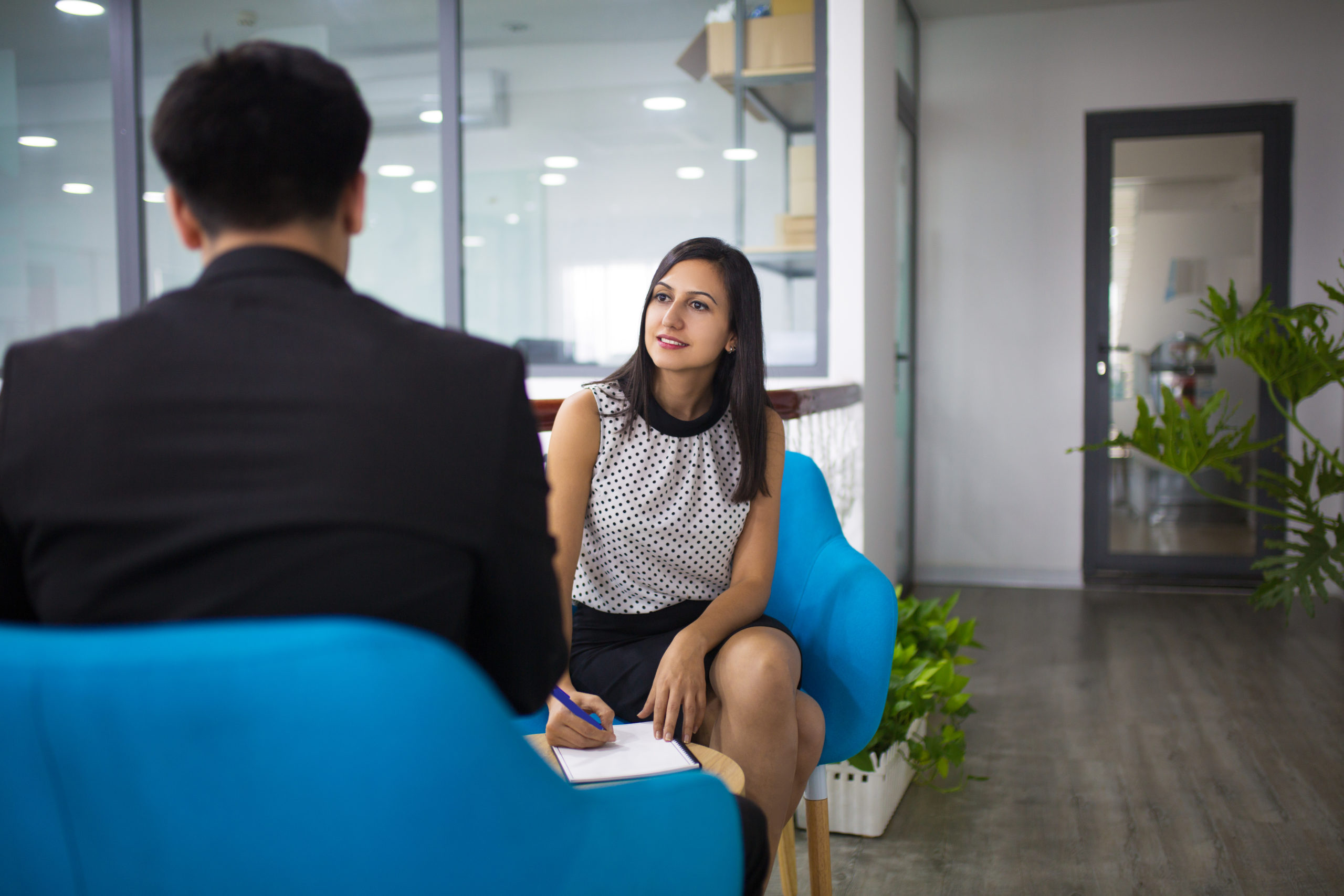 Portrait of smiling hr manager having interview with candidate » NFP Ireland