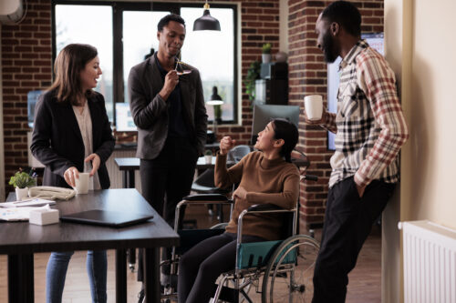 Multiethnic group of colleagues laughing in business office » NFP Ireland Diversity, Equality & Inclusion Discounted Bundle